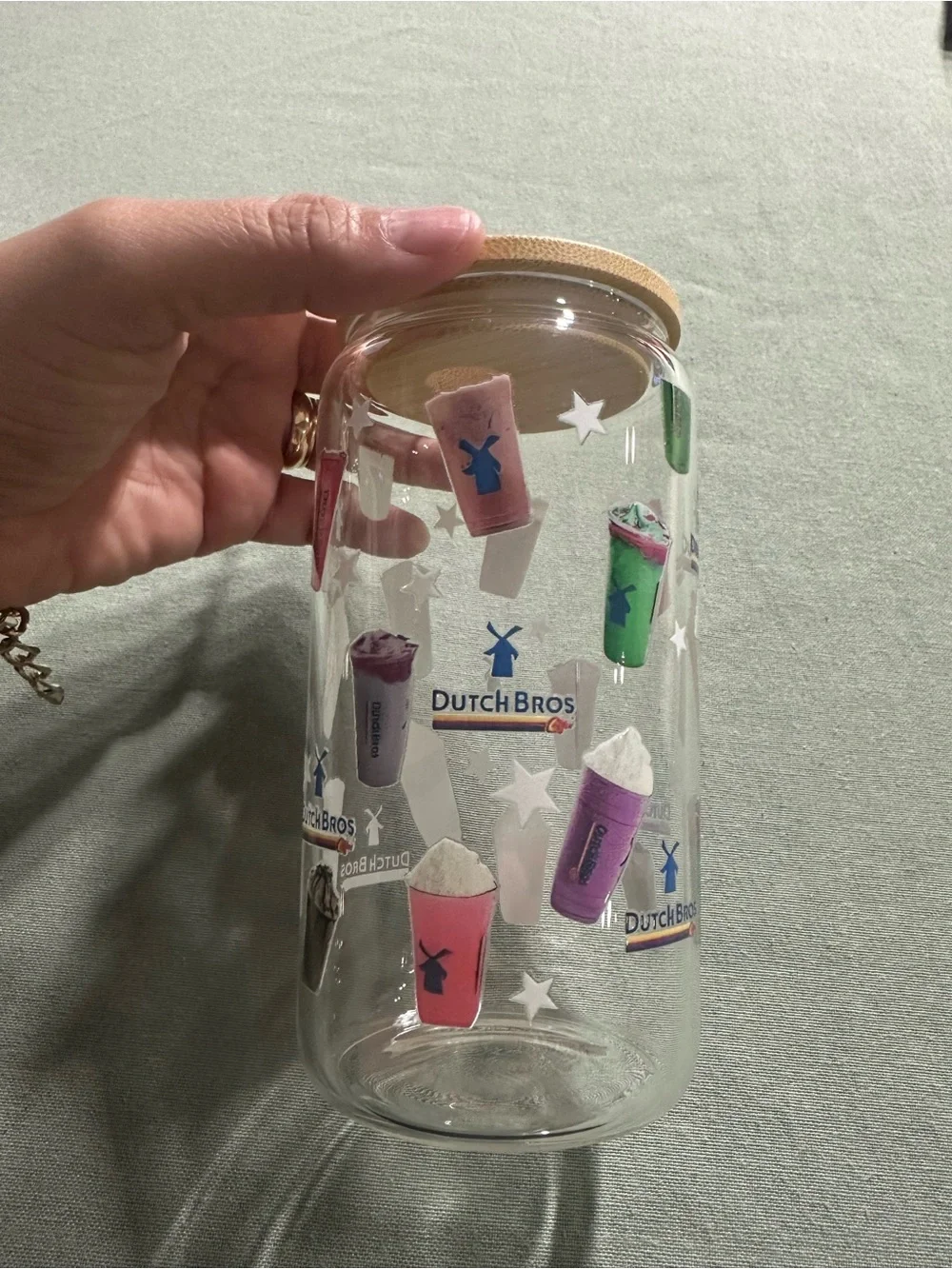 Dutch Bros Clear Glass Tumbler with Colorful Cup Designs and Bamboo Lid